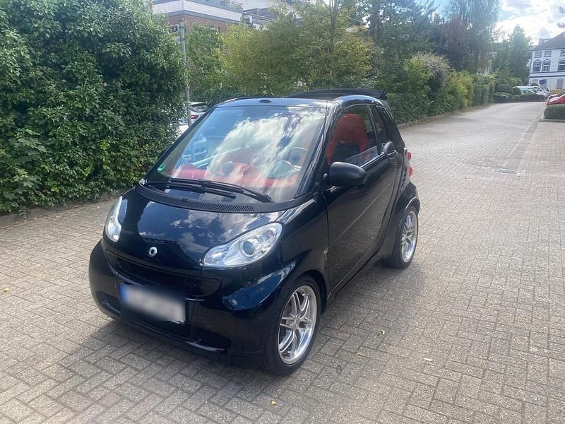 Schwarz Gebraucht 2010 Smart ForTwo Cabrio Brabus Cabrio | 5.900 € (Guter Preis) - Bild 1/4