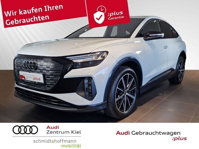 Gletscherweiß metallic Gebraucht 2024 Audi Q4 Sportback e-tron Ambiente SUV | 53.980 € (Etwas zu teuer) - Bild 1/4