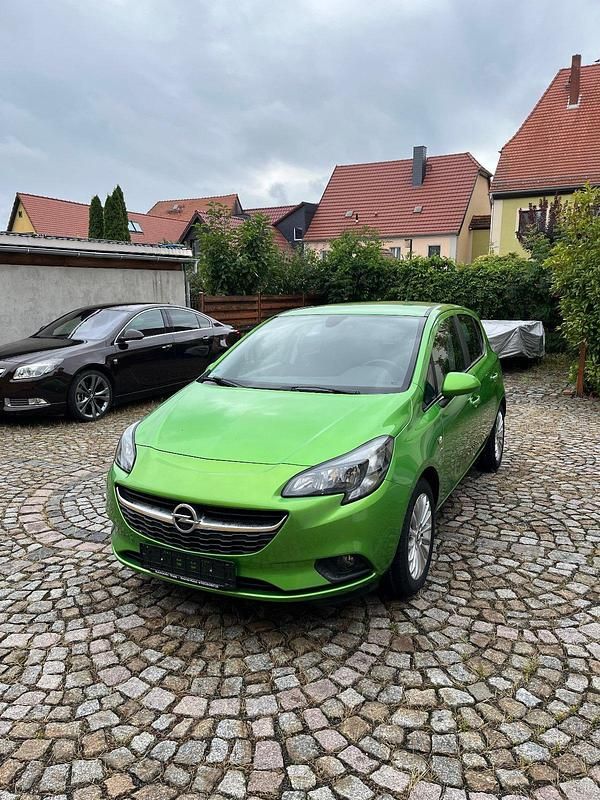 Grün Gebraucht 2016 Opel Corsa drive Kleinwagen | 7.999 € (Fairer Preis) - Bild 1/4