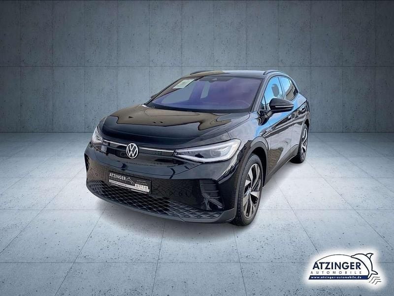 Grenadillschwarz (metallic) Gebraucht 2023 VW ID.4 Pro Performance SUV | 32.990 € (Fairer Preis) - Bild 1/4