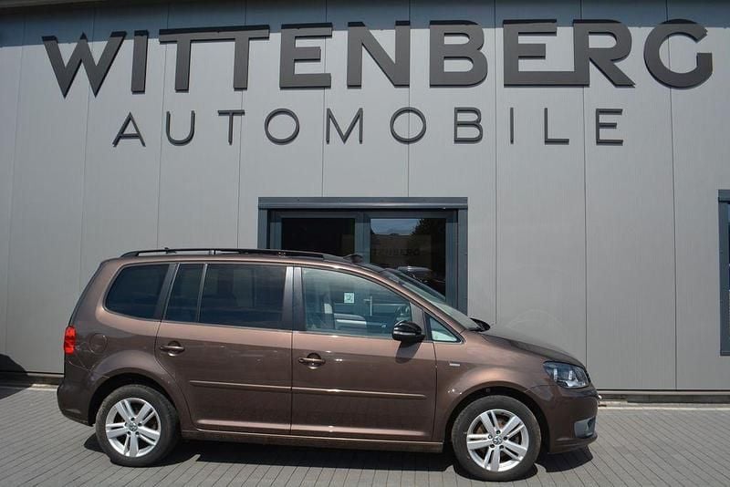 Toffee/graciosabraun Gebraucht 2012 VW Touran Match Van / Kleinbus | 10.900 € - Bild 1/4