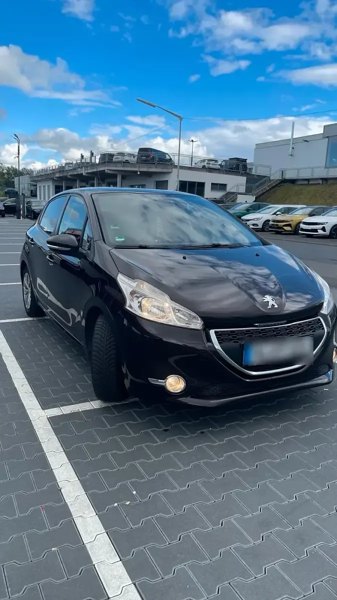 Gebraucht Peugeot 208 95 PS (69 kW) 2012 Braun Kleinwagen