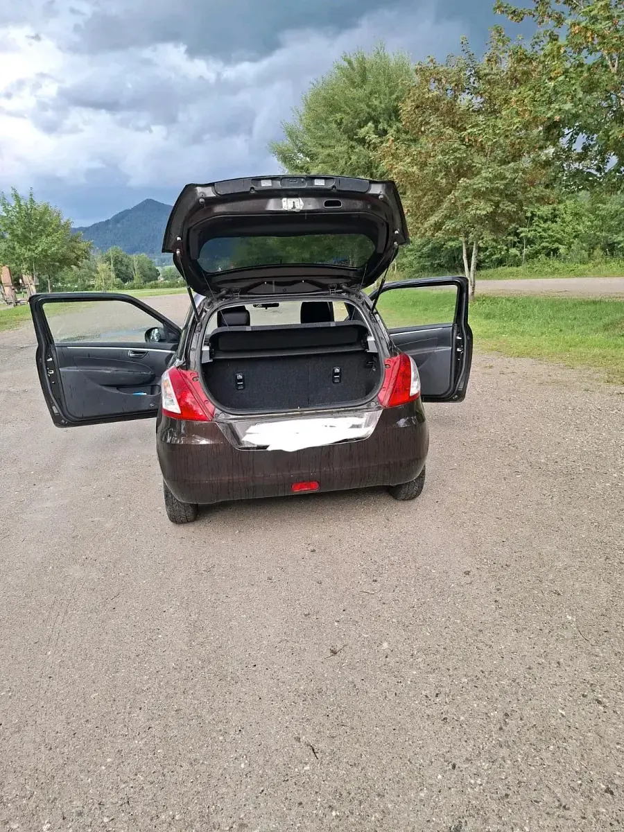 Gebraucht Suzuki Swift 94 PS (69 kW) 2015 Braun Kleinwagen