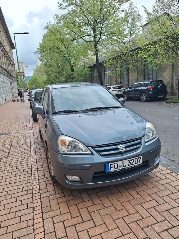 Grau Gebraucht 2005 Suzuki Liana Club Limousine | 1.000 € - Bild 1/4
