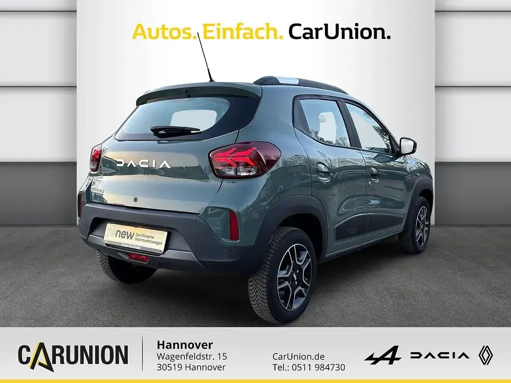 Gebraucht Dacia Spring Essentiel 33 kW (45 PS) 2023 Olivgrau Kleinwagen
