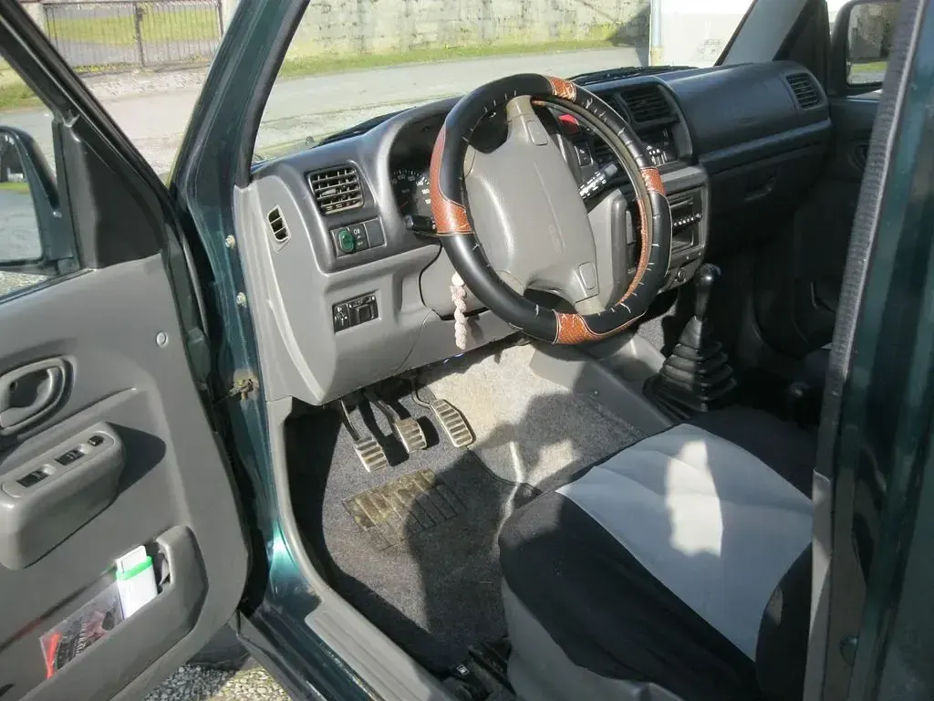 Gebraucht Suzuki Jimny 82 PS (60 kW) 2001 Grün SUV