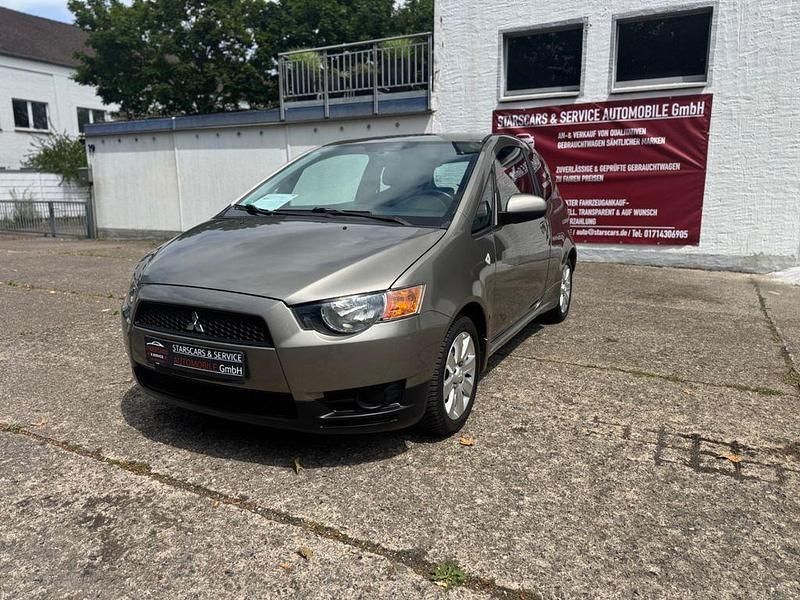 Grau Gebraucht 2012 Mitsubishi Colt Motion Kleinwagen | 7.450 € (Etwas zu teuer) - Bild 1/4