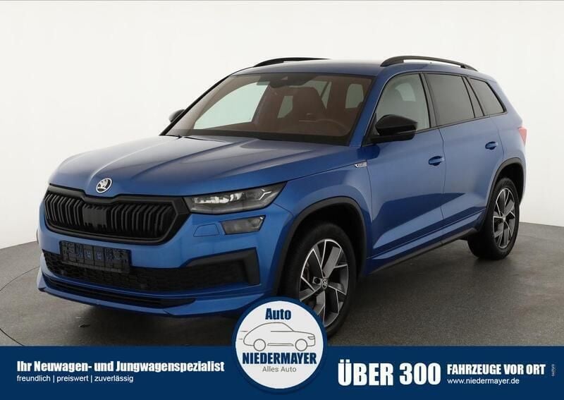 Race blau metallic Gebraucht 2022 Skoda Kodiaq SportLine SUV | 33.995 € (Guter Preis) - Bild 1/4