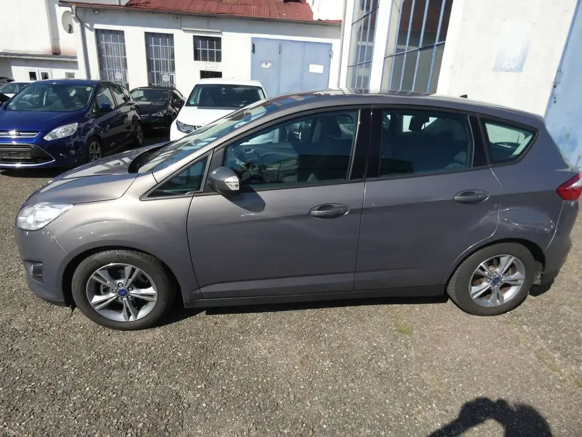 Gebraucht Ford C-MAX SYNC Edition 125 PS (91 kW) 2015 Brisbane braun (met.) Van / Kleinbus