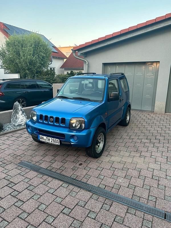 Blau Gebraucht 1999 Suzuki Jimny SUV | 3.499 € (Fairer Preis) - Bild 1/4