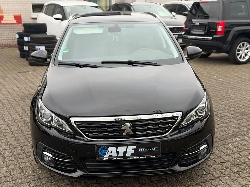 Gebraucht Peugeot 308 SW Allure 131 PS (96 kW) 2018 Orange Kombi