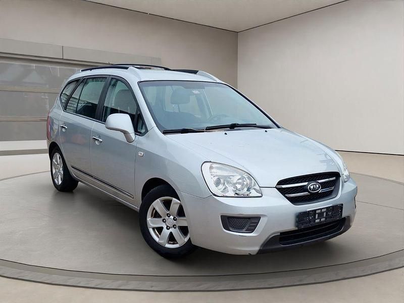 Grau Gebraucht 2006 Kia Carens Van / Kleinbus | 1.893 € (Etwas zu teuer) - Bild 1/4