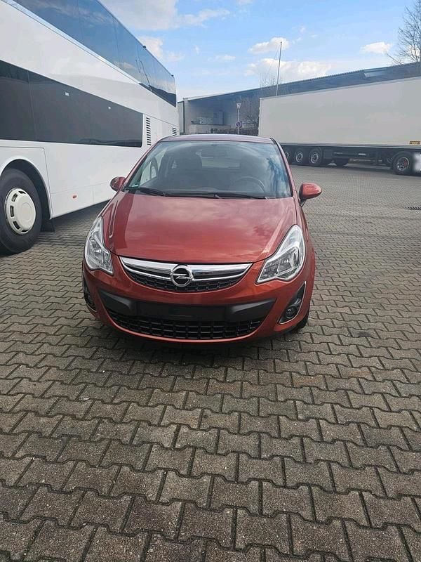 Gebraucht Opel Corsa 87 PS (63 kW) 2012 Orange Kleinwagen