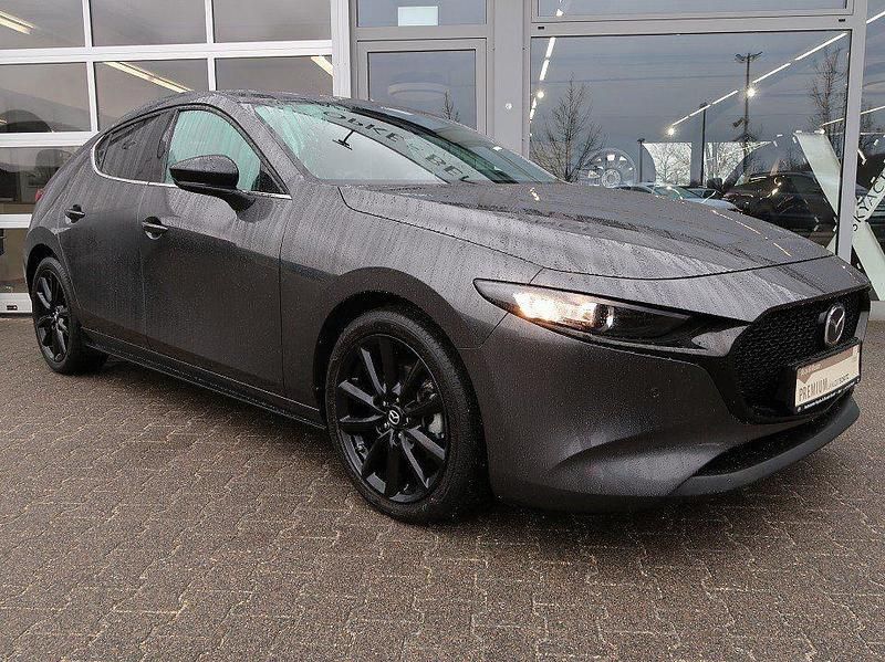 Gebraucht Mazda 3 Homura-Line 186 PS (136 kW) 2022 Machine grey metallic (metallic) Limousine
