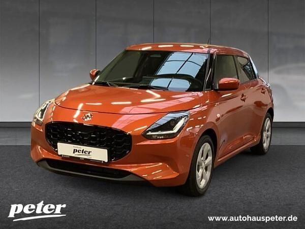 Orange (flame orange met.) Gebraucht 2025 Suzuki Swift Comfort Kleinwagen | 15.750 € (Fairer Preis) - Bild 1/4