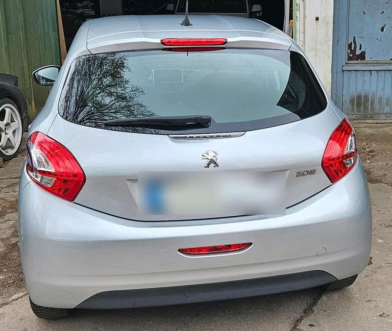 Second-hand Peugeot 208 68 CP (50 kW) 2012 Argintiu Hatchback
