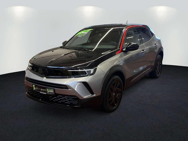 Gebraucht Opel Mokka GS Line 131 PS (96 kW) 2023 Kontrast grau/quarz silber SUV