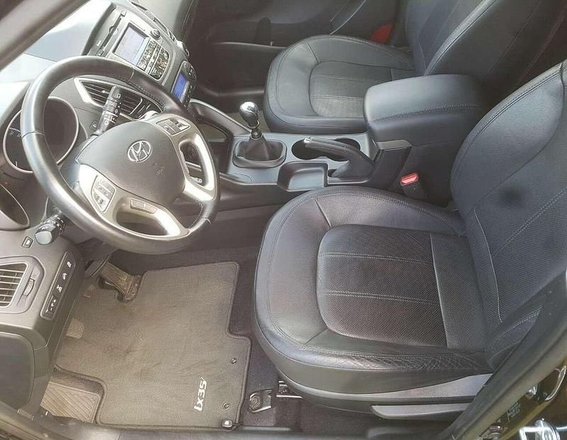 Schwarz Gebraucht 2012 Hyundai ix35 Premium SUV | 6.880 € (Superpreis) - Bild 1/4