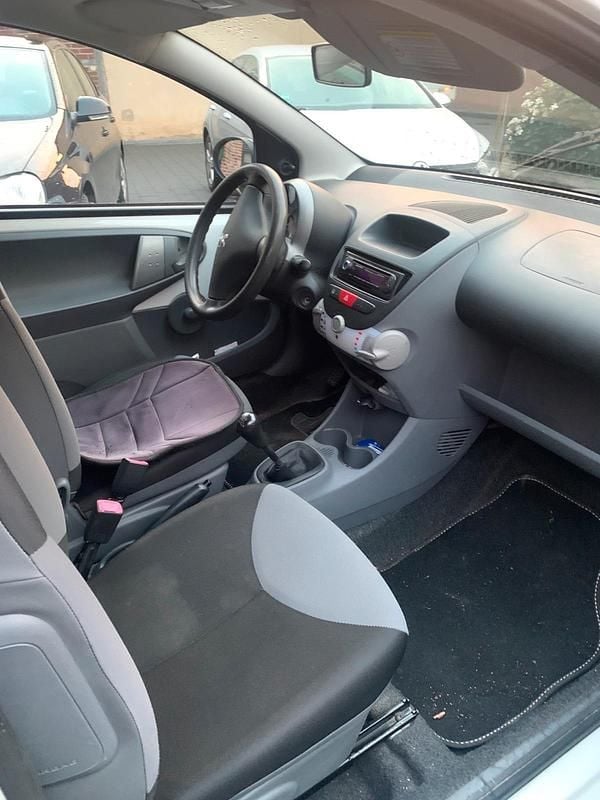 Gebraucht Peugeot 107 68 PS (50 kW) 2014 Weiß Kleinwagen