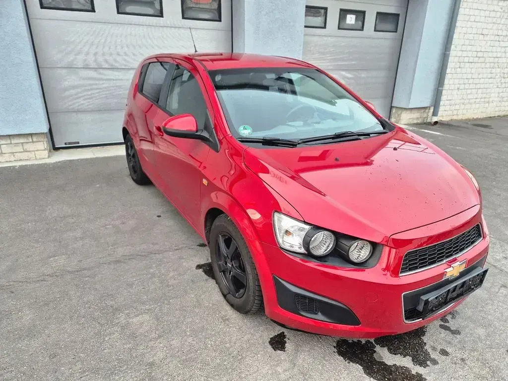 Gebraucht Chevrolet Aveo LT 86 PS (63 kW) 2011 Flame red Kleinwagen