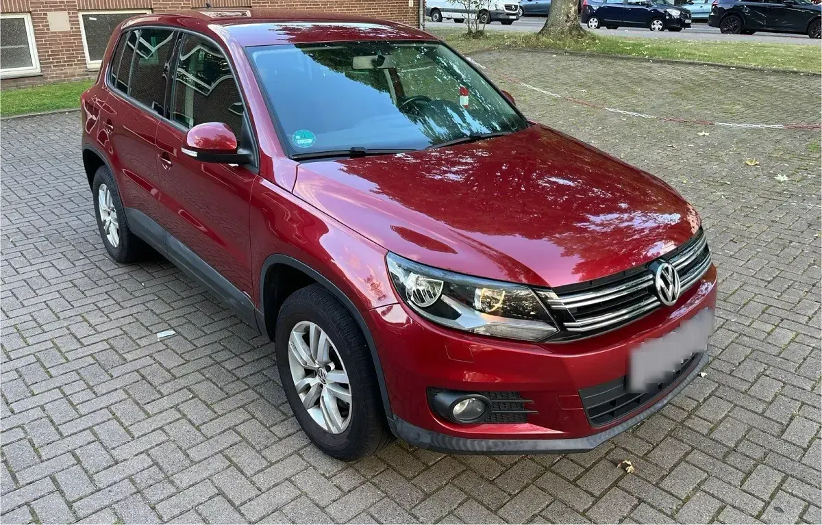 Używany VW Tiguan 122 KM (89 kW) 2012 Czerwony SUV