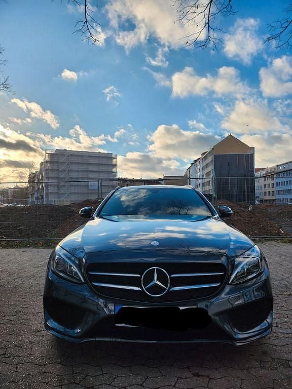 Grau Gebraucht 2016 Mercedes C250 AMG line Limousine | 15.600 € (Superpreis) - Bild 1/4