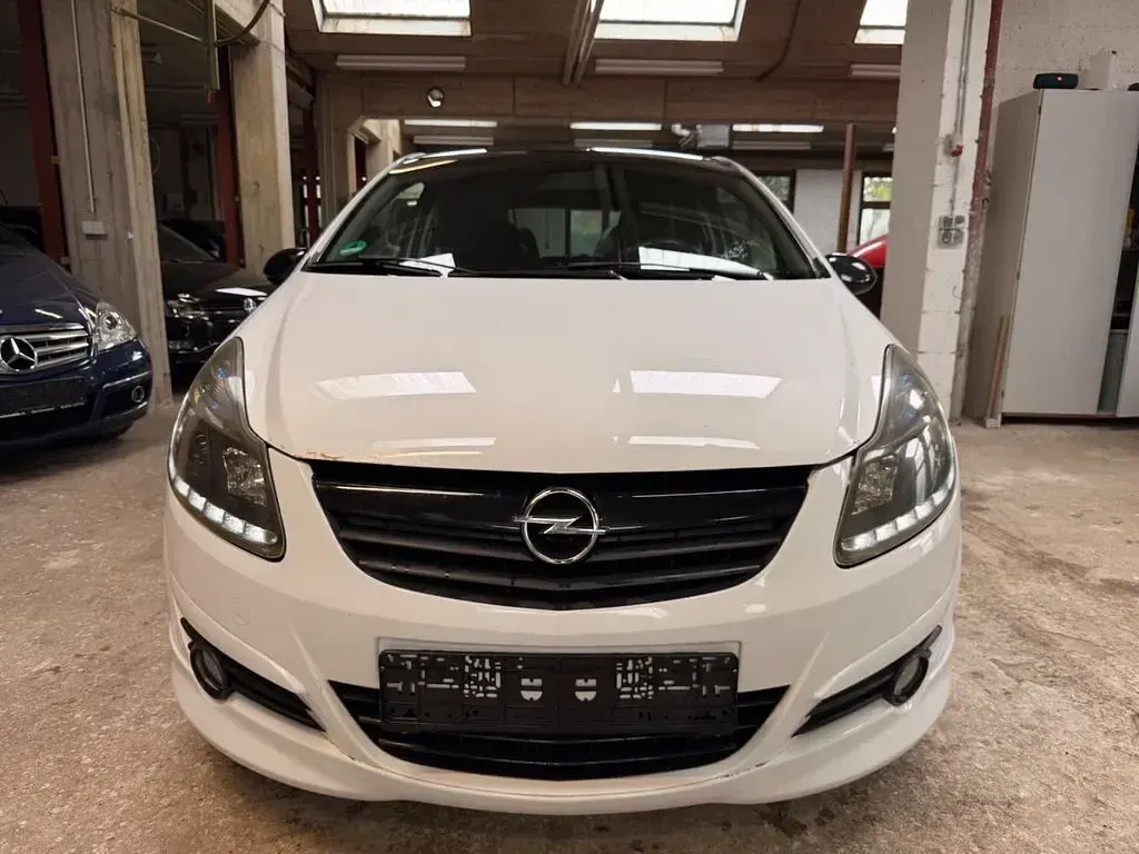 Używany Opel Corsa Edition 90 KM (66 kW) 2009 Czarny Hatchback