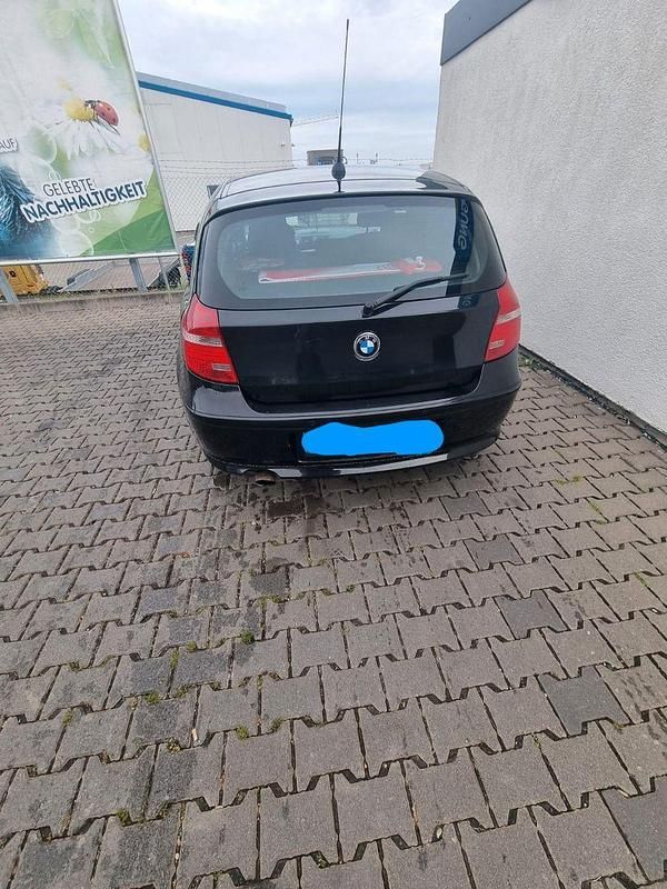 Gebraucht BMW 116 122 PS (89 kW) 2009 Schwarz Kleinwagen