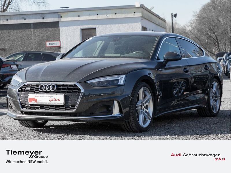 Grau Gebraucht 2024 Audi A5 Sportback S-Line Limousine | 36.880 € (Superpreis) - Bild 1/4