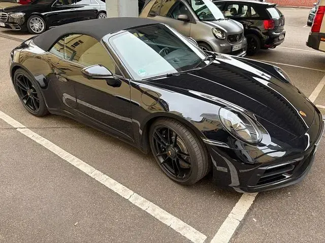 Gebraucht Porsche 911 480 PS (353 kW) 2023 Tiefschwarz (metallic) Cabrio