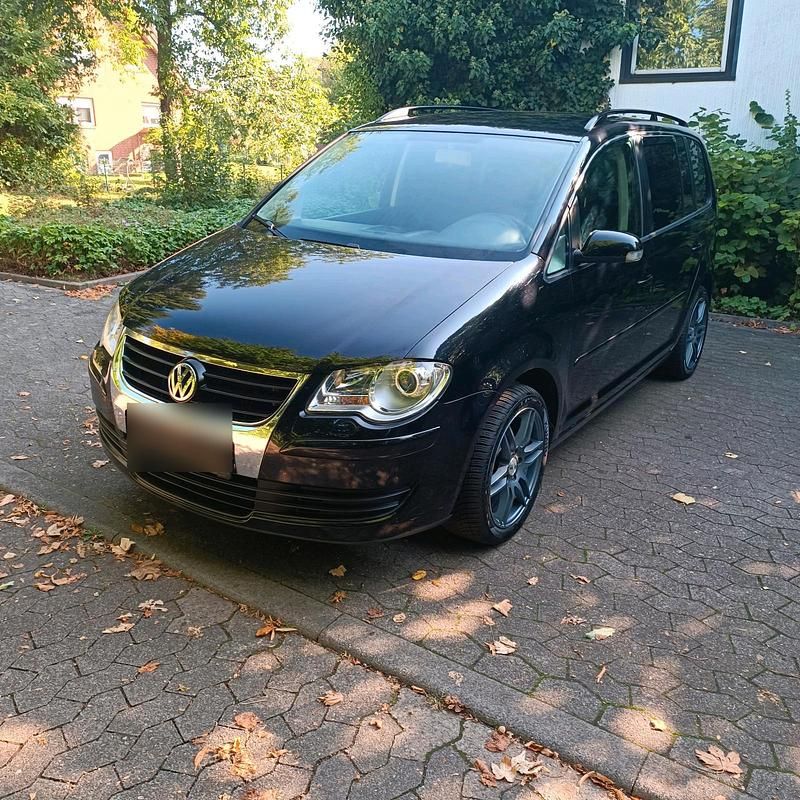 Schwarz Gebraucht 2007 VW Touran Van / Kleinbus | 3.499 € (Fairer Preis) - Bild 1/4