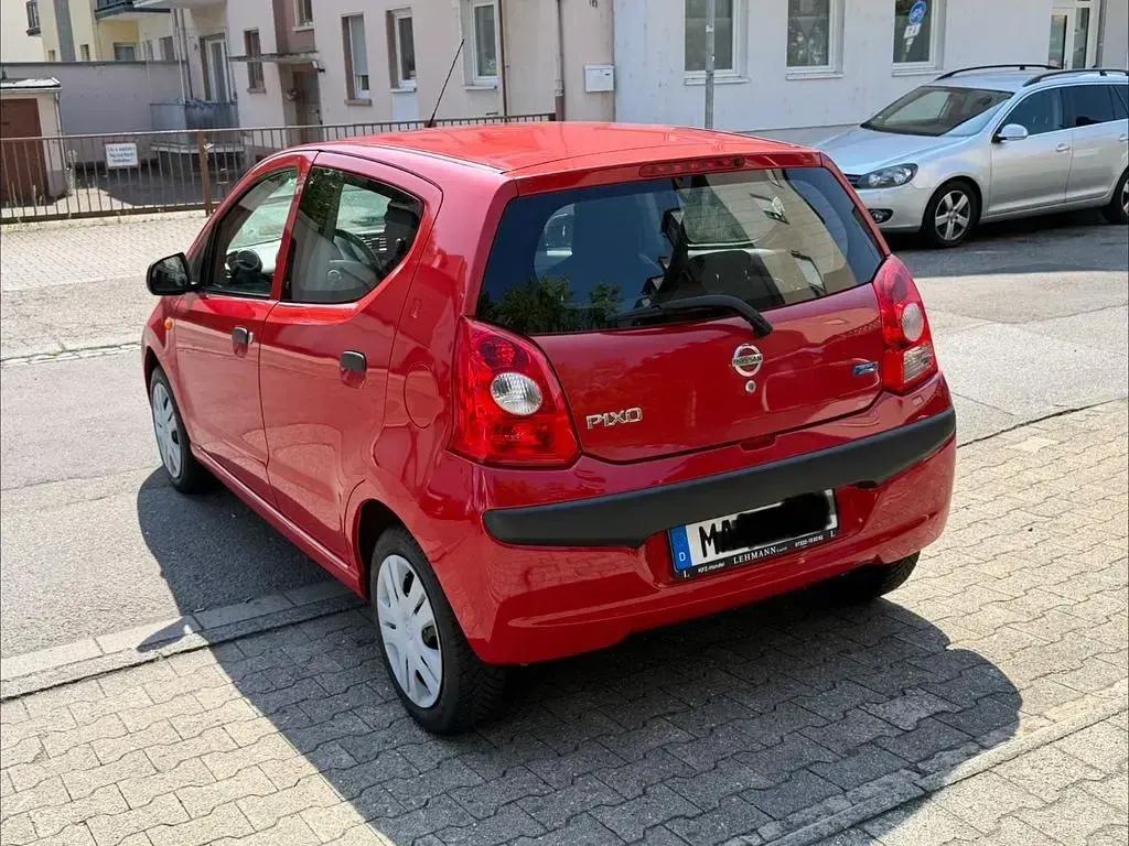 Gebraucht Nissan Pixo Acenta 68 PS (50 kW) 2010 Rot Kleinwagen