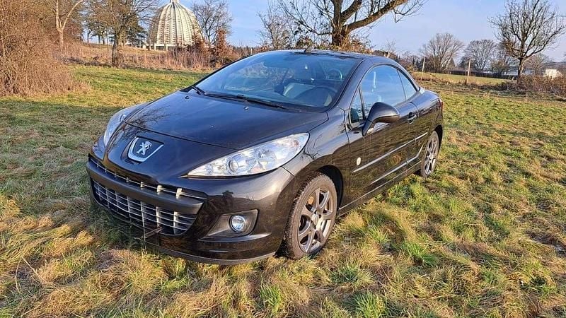 Schwarz Gebraucht 2012 Peugeot 207 CC Roland Garros Cabrio | 5.600 € (Fairer Preis) - Bild 1/4