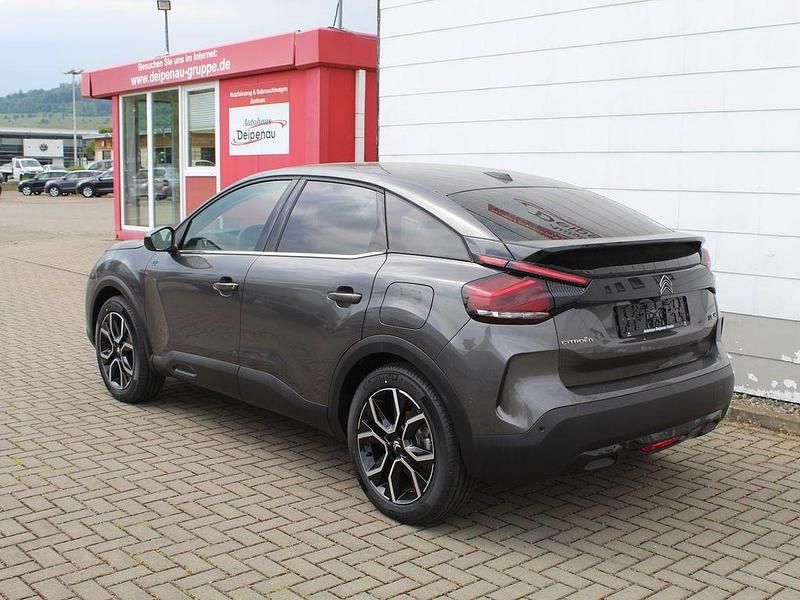 Gebraucht Citroën e-C4 Shine 100 kW (136 PS) 2023 Platinumgrau Limousine