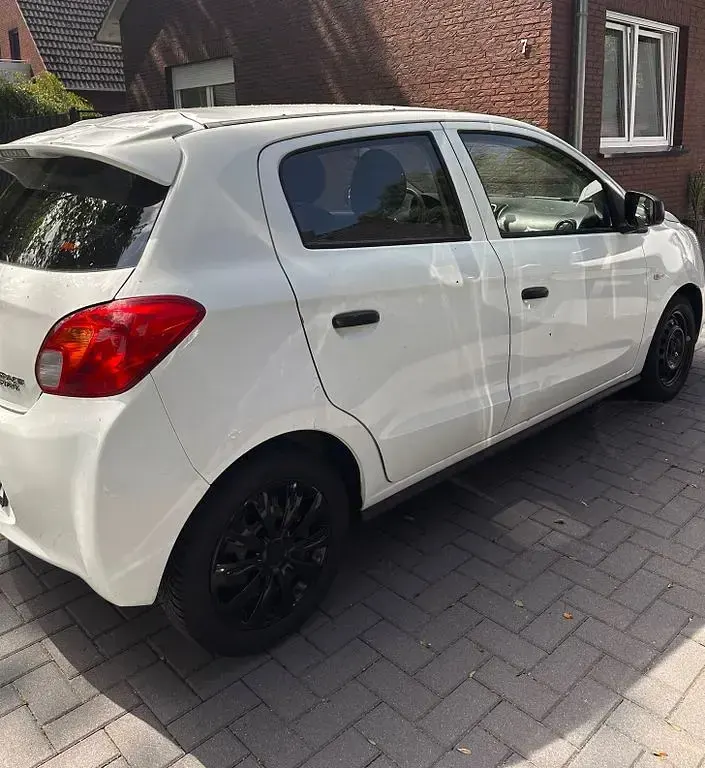 Gebraucht Mitsubishi Space Star 71 PS (52 kW) 2013 Weiß Van / Kleinbus