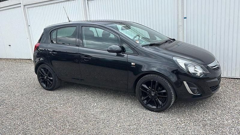 Używany Opel Corsa Active 87 KM (63 kW) 2013 Czarny Hatchback
