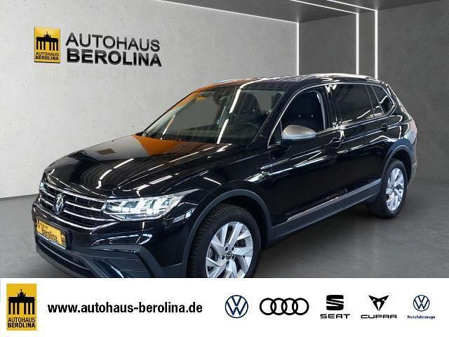 Schwarz Gebraucht 2024 VW Tiguan Allspace Life SUV | 38.888 € (Superpreis) - Bild 1/4