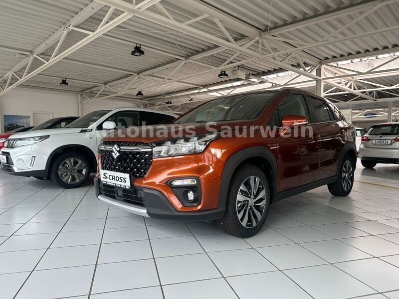 Braun Gebraucht 2024 Suzuki SX4 S-Cross SUV | 36.990 € - Bild 1/4