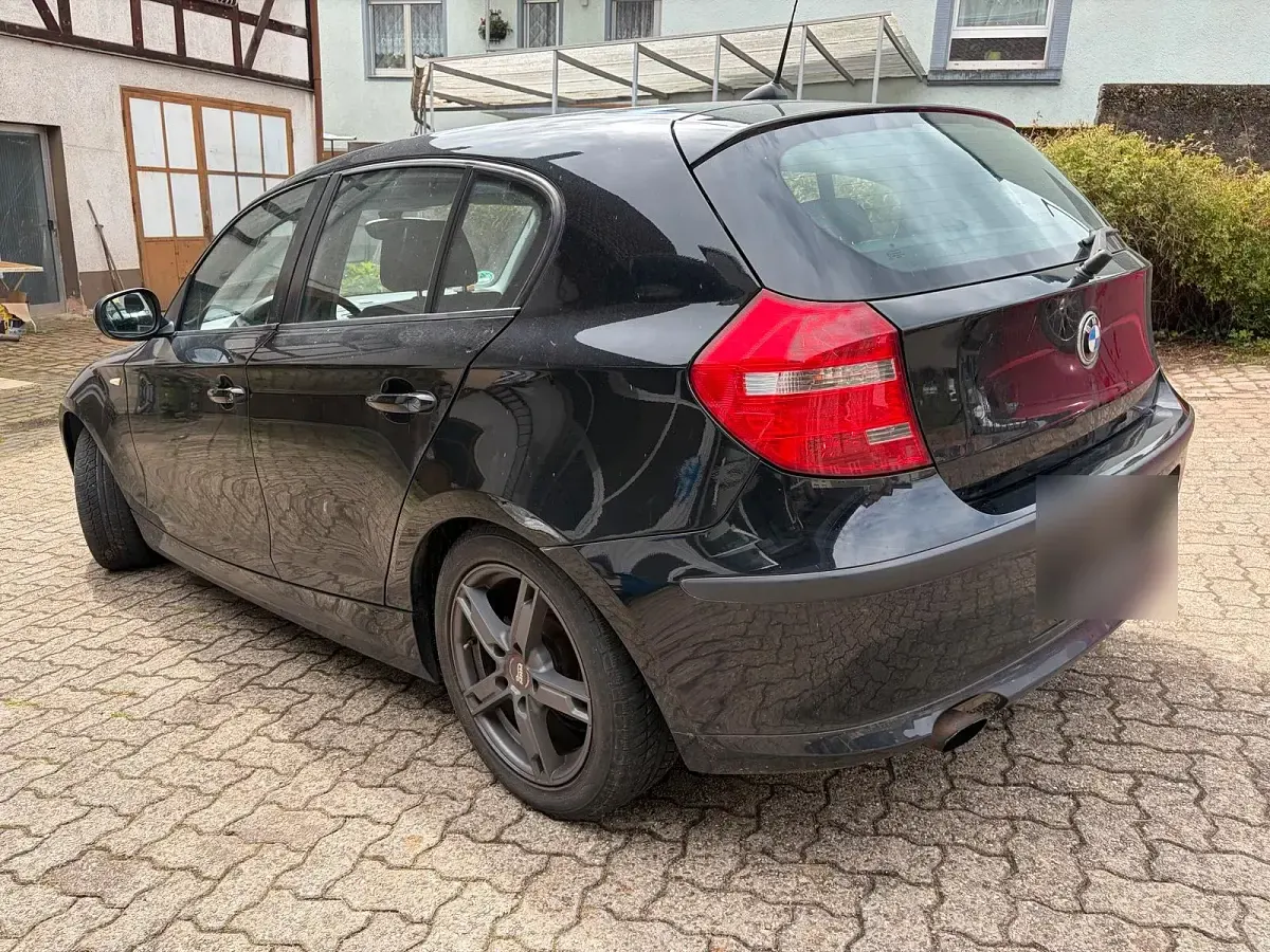 Używany BMW 116 122 KM (89 kW) 2010 Czarny Hatchback