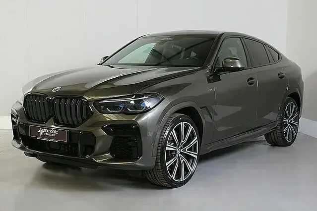 Gebraucht BMW X6 M50 Shadowline 530 PS (389 kW) 2023 Manhatten met. (braun) SUV