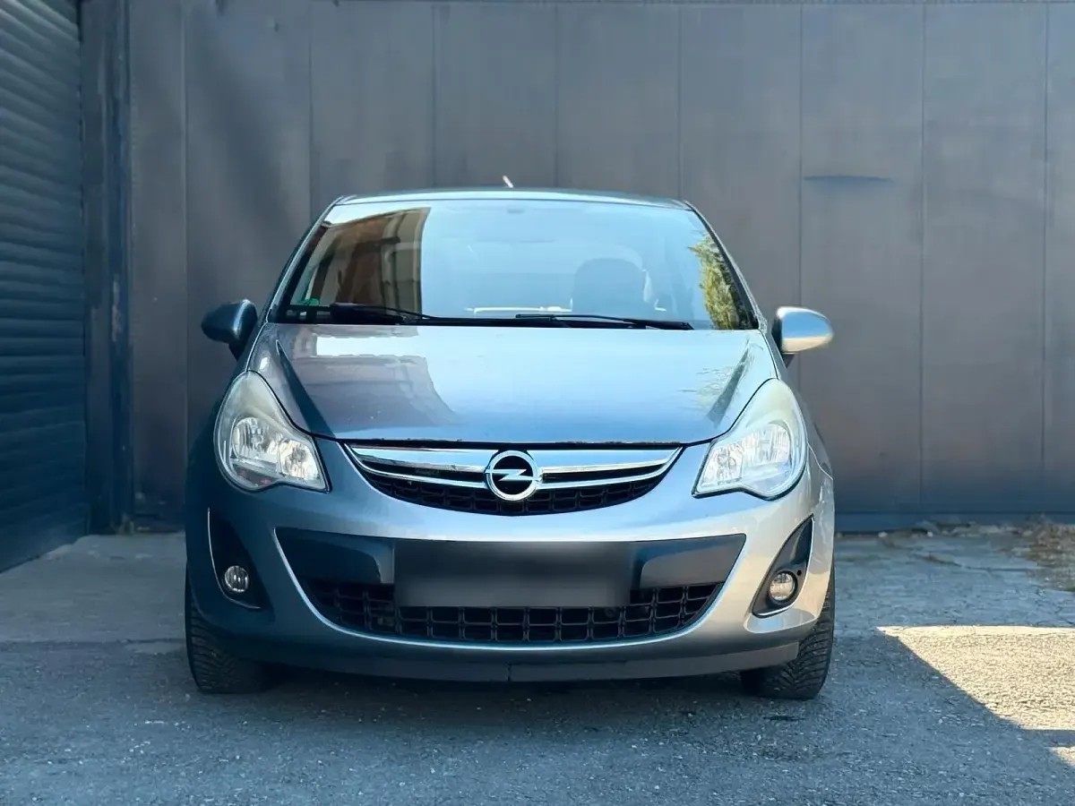 Usado Opel Corsa 86 HP (63 kW) 2012 Cinzento Citadino