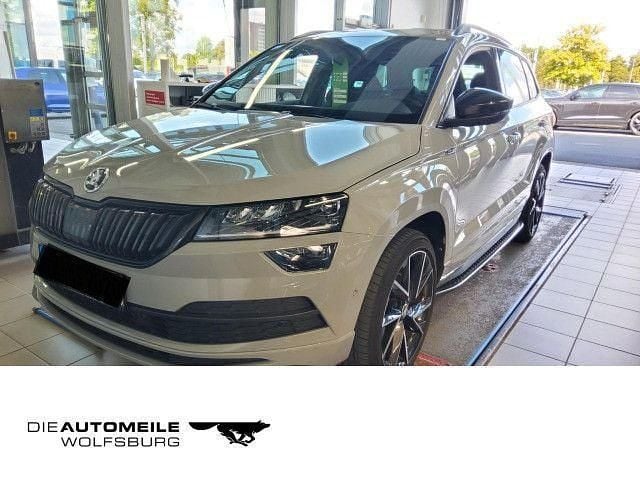 Stahlgrau Gebraucht 2021 Skoda Karoq SportLine SUV | 26.990 € (Superpreis) - Bild 1/4