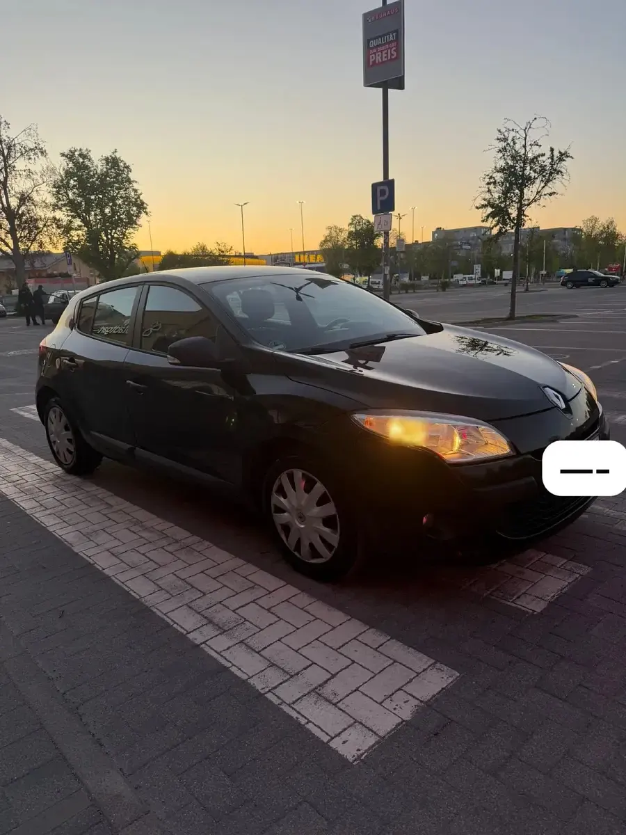 Używany Renault Mégane 110 KM (80 kW) 2011 Czarny Sedan/Limuzyna