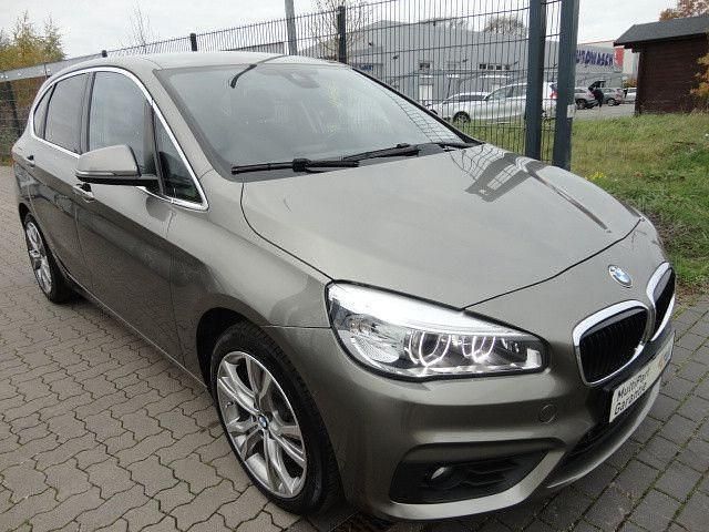 Grau Gebraucht 2014 BMW 218 Active Tourer Basis Van / Kleinbus | 13.900 € (Teuer) - Bild 1/4