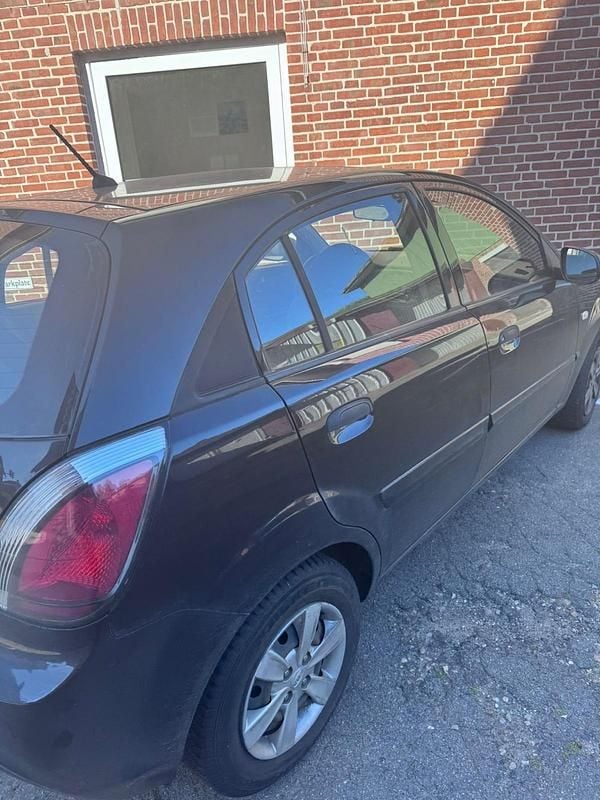 Gebraucht Kia Rio 97 PS (71 kW) 2009 Schwarz Kleinwagen