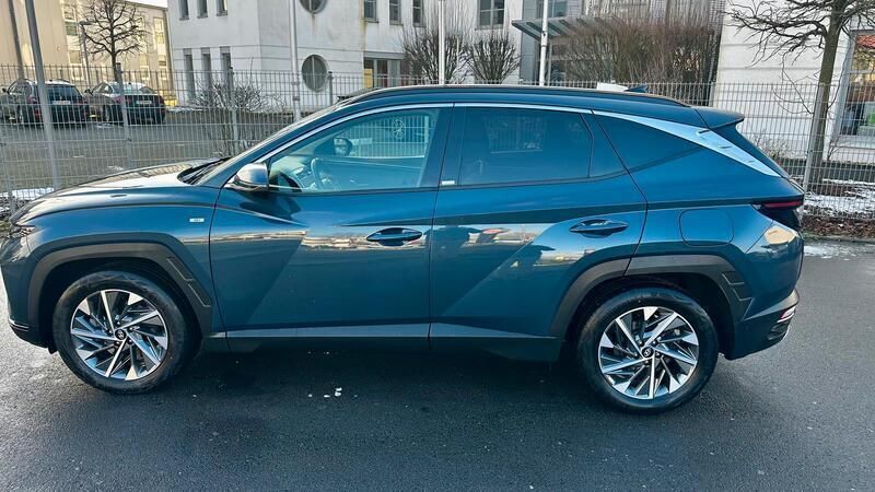 Blau Gebraucht 2021 Hyundai Tucson Trend SUV | 23.599 € (Superpreis) - Bild 1/4