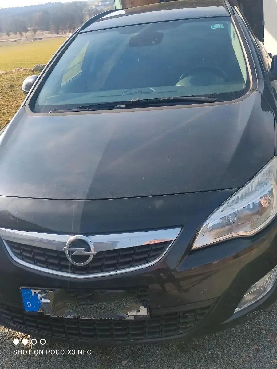 Second-hand Opel Astra 180 CP (132 kW) 2011 Negru Break