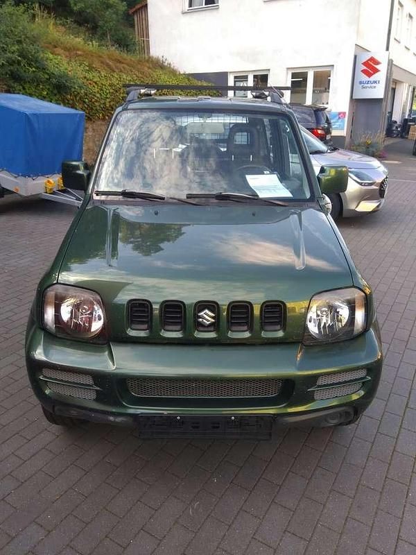Grün metallic Gebraucht 2012 Suzuki Jimny Ranger SUV | 11.590 € (Fairer Preis) - Bild 1/4
