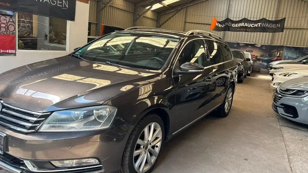 Second-hand VW Passat Highline 177 CP (130 kW) 2013 Negru Break