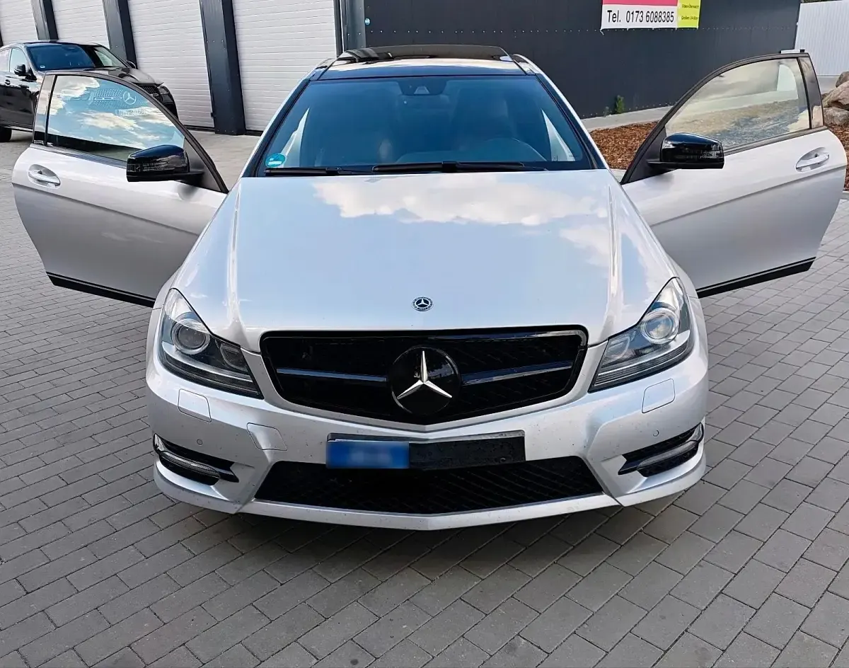 Gebraucht Mercedes C180 AMG 156 PS (114 kW) 2015 Silber Coupé